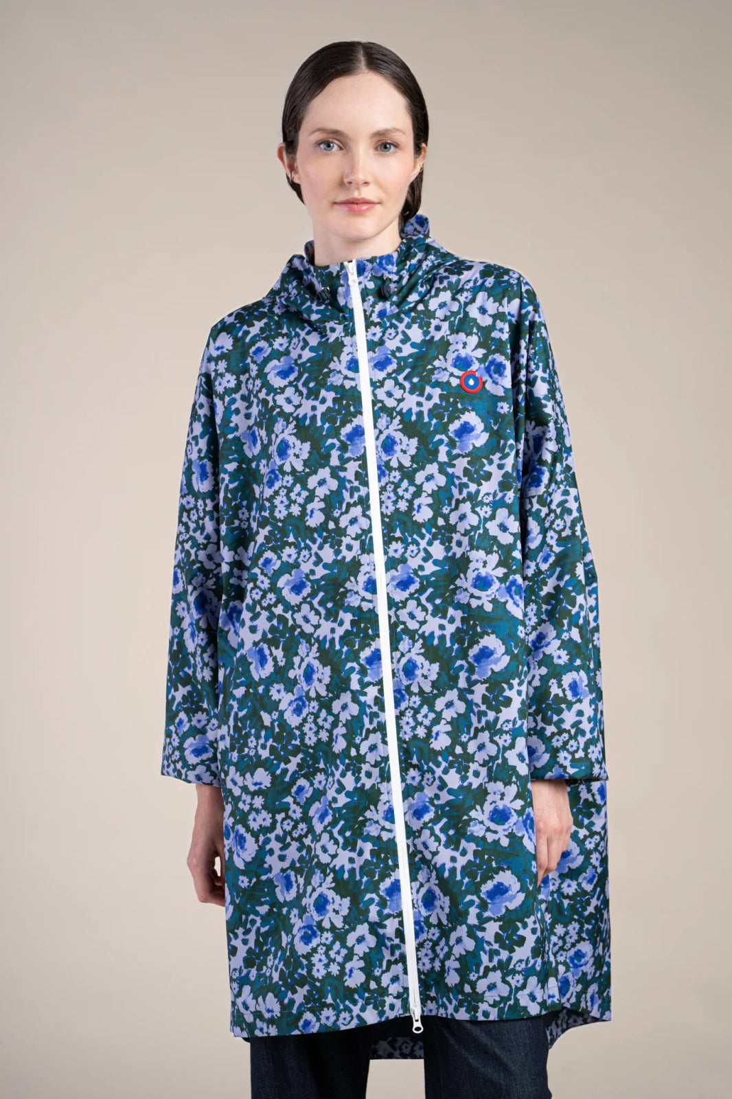 Liberté - Cape de pluie - Veste coupe-vent modulable en sac - Flotte #couleur_geranium